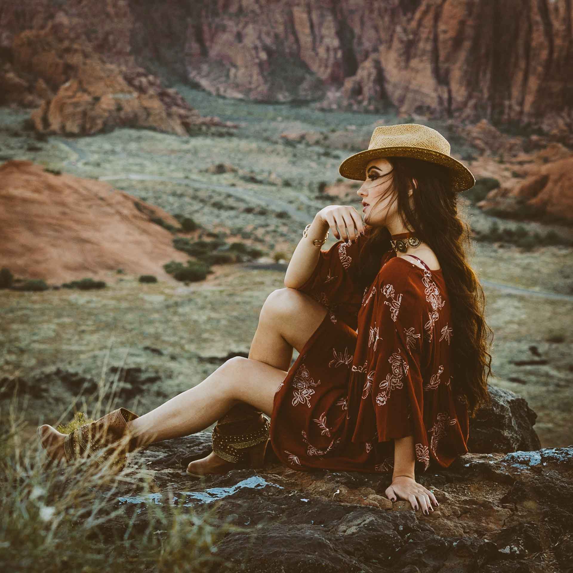 Desert fashion photography with model in bohemian style